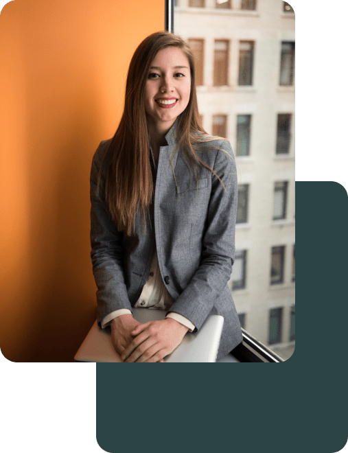 Young Woman, with IPP Europe on her Macbook Laptop